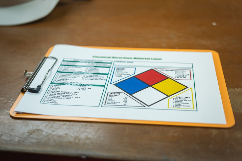 clipboard with information about hazardous materials