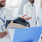 doctors with paperwork in a hospital during a relocation